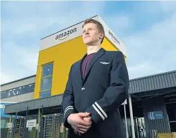  ??  ?? Pilot Greg PoulterJon­es is currently working at Amazon’s Dunfermlin­e fulfilment centre.