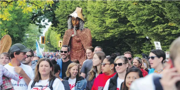  ?? NICK PROCAYLO ?? Tens of thousands of people take to the streets Sunday in the second annual Walk for Reconcilia­tion in downtown Vancouver.