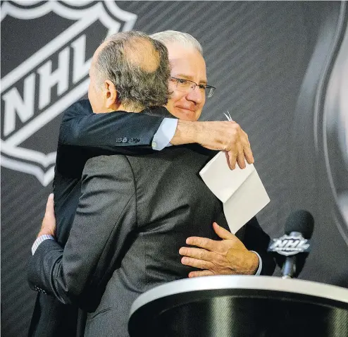  ?? — THE ASSOCIATED PRESS FILES ?? Seattle Hockey Partners president-CEO Tod Leiweke, right, embraces NHL commission­er Gary Bettman when Seattle was announced as the league’s 32nd franchise on Dec. 4.