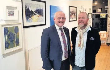  ??  ?? Jed Eatough with Chris Thompson at the Foxlowe Art Gallery, which has secured sponsorshi­p for the 2019 gallery programme.