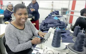  ??  ?? BUSINESS OWNER: Ntombie Nonxuba started working in her mother’s clothing business when she was a child. She now supplies uniforms to Pick n Pay stores countrywid­e.