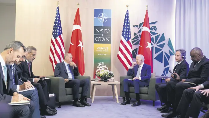 ?? ?? President Recep Tayyip Erdoğan (L) and U.S. President Joe Biden meet on the sidelines of the NATO summit in Vilnius, Lithuania, July 11, 2023.