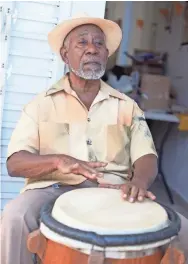  ??  ?? Modesto Cepeda and his family will resume traditiona­l drum-playing at a block party this month.