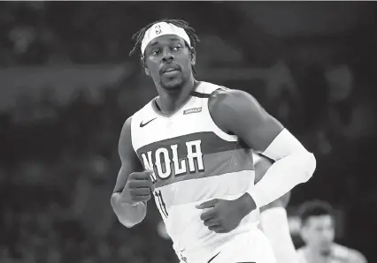  ?? Katelyn Mulcahy, Getty Images ?? Jrue Holiday of the New Orleans Pelicans would look good in a Nuggets jersey.