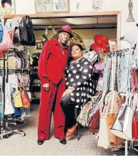  ?? EVAN JENKINS THE NEW YORK TIMES FILE PHOTO ?? George and Janet Davis, in their clothing shop in Peoria, Ill., went on a local radio station to plead for the looting to stop.