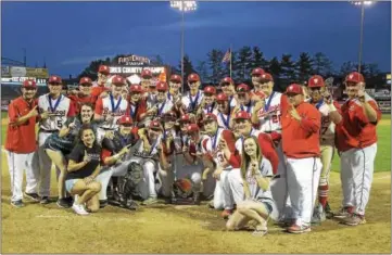  ?? SARAH PIETROWSKI - FOR DIGITAL FIRST MEDIA ?? The Wilson baseball team celebrates with the county championsh­ip trophy after defeating Twin Valley in the final on May 17.