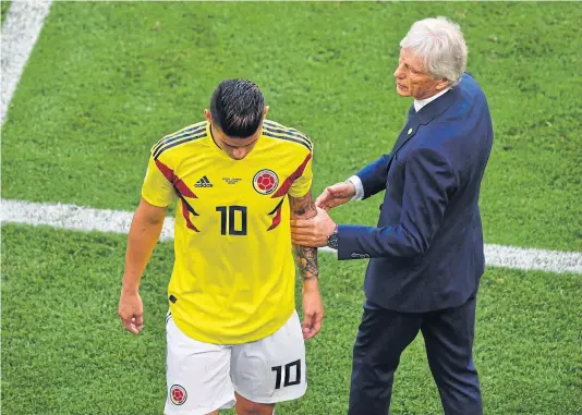  ?? FABRiCE COFRini / AFP ?? James Rodríguez salió lesionado contra Senegal y pekerman espera la evolución