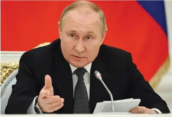  ?? DR ?? Putin diz que desconside­rar os interesses de outros “leva ao caos e provoca crises económicas”