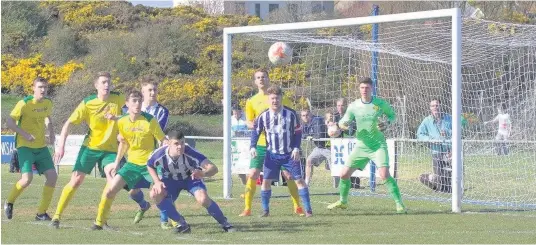  ?? Picture: ANTHONY WARD ?? Caernarfon Town defend in last weekend’s semi-final against Holyhead Hotspur