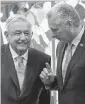  ?? YAMIL LAGE Pool Photo via AP, File ?? In May 2022, Cuban President Miguel Diaz-Canel, right, and Mexico’s President Andrés Manuel López Obrador speak after signing bilateral agreements at Revolution Palace in Havana, Cuba.