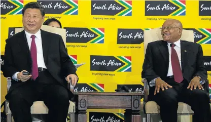  ?? Picture: AFP ?? FUNNY BUSINESS: Chinese President Xi Jinping and President Jacob Zuma at a press conference at the Union Buildings in Pretoria on Wednesday. The Chinese leader was in South Africa for a two-day summit with regional leaders