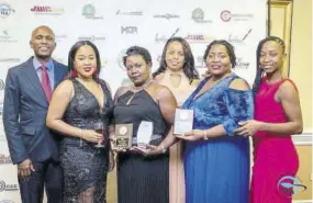  ??  ?? Deandra Chung (second left), past president of YEA, flanked by YEA 2018 Entreprene­ur Awards winners