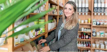 ?? SIMON O’CONNOR/STUFF ?? Former magazine account manager Lisa Deken now runs an organics store, and she loves it.