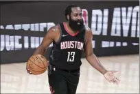  ?? AP file photo ?? James Harden has yet to report to Houston Rockets camp. The Rockets start the preseason Thursday against the Bulls and open the regular season Dec. 23 at home against the Thunder.