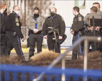  ?? Brian A. Pounds / Hearst Connecticu­t Media ?? State Police were out in force to protect the Capitol from a planned Trump election protest in Hartford on Sunday.