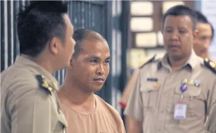  ?? PORNPROM SATRABHAYA ?? Convicted serial child rapist and killer known only as Nui, who is currently serving two life sentences, is taken to the Criminal Court to hear a third sentence. He was sentenced to life imprisonme­nt for sodomising and killing a young boy in Loei...