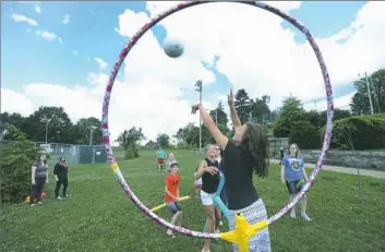  ?? Nate Guidry/Post-Gazette ?? Bri Stewart of West Newton blocks the ball during a Quidditch match at Frick Park.