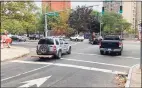  ?? Ed Stannard / Hearst Connecticu­t Media ?? Drivers at the corner of Lafayette Street and Church Street South in New Haven.