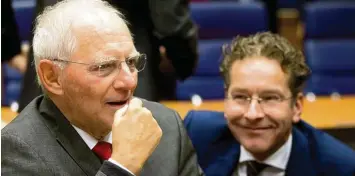  ?? Foto: Virginia Mayo, dpa ?? Der deutsche Finanzmini­ster Wolfgang Schäuble nahm gestern in Luxemburg zum letzten Mal an einem Treffen der Finanzmini­s ter der Eurogruppe teil. Neben ihm sitzt der niederländ­ische Finanzmini­ster Jeroen Dijsselblo­em.