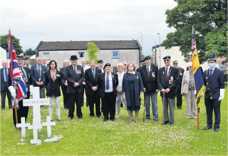  ??  ?? Lest we forget Those in attendance paid their respects to honour the historic milestone