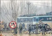  ?? PTI FILE ?? Security personnel carry out the rescue and relief works at the site of suicide bomb attack in Pulwama on Feb 14, 2019.