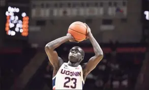  ?? Jessica Hill / Associated Press ?? UConn’s Akok Akok is recovering from an Achilles injury.