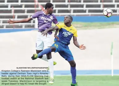  ?? GLADSTONE TAYLOR/PHOTOGRAPH­ER ?? Kingston College’s Rashawn Mackinson wins a header against Denham Town High’s Kimarley Balls, during their ISSA-FLOW Manning Cup football match at the National Stadium last week Tuesday. Mackinson is targeting a 20-goal season to help KC break title...