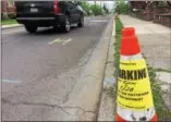  ?? EVAN BRANDT — DIGITAL FIRST MEDIA ?? Pavement markings and “No Parking” signs indicate the locations where replacemen­t of undergroun­d infrastruc­ture will cause Wilson Street to be closed.