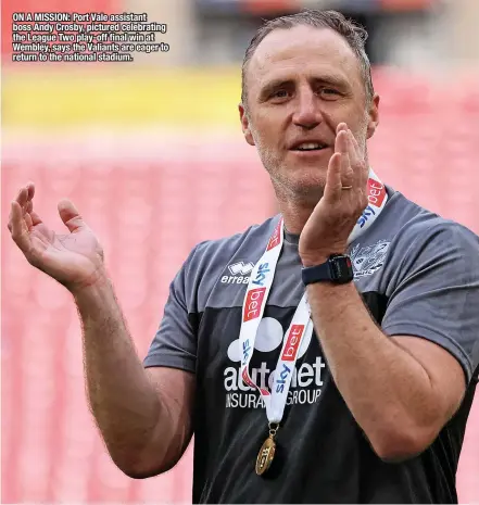  ?? ?? ON A MISSION: Port Vale assistant boss Andy Crosby, pictured celebratin­g the League Two play-off final win at Wembley, says the Valiants are eager to return to the national stadium.