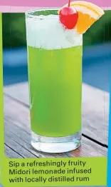  ??  ?? Sip a refreshing­ly fruity Midori lemonade infused with locally distilled rum