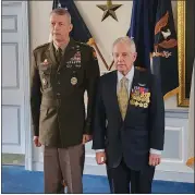  ?? BILL RETTEW — MEDIANEWS GROUP ?? Four Star Gen. Daniel R. Hokanson, left, presents the Silver Star to helicopter pilot Lawrence Liss.