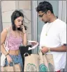  ?? AP PHOTO/MARK LENNIHAN ?? Gabriela Garcia, left, and her friend Raafae Ghory check their receipt Monday after shopping at a Whole Foods Market in New York.