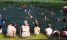  ?? Nils Jorgensen/REX/Shuttersto­ck ?? Wild swimming at Latitude 2022. Photograph: