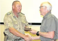  ?? > Photos: Supplied ?? Section ranger Neels van Wyk and retired head ranger Ken Maggs.