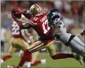  ?? NHAT V. MEYER — BAY AREA NEWS GROUP ?? Emmanuel Sanders makes a catch against the Seahawks’ Neiko Thorpe on Nov. 11 in Santa Clara.