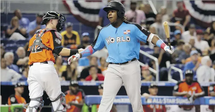  ?? LYNNE SLADKY/THE ASSOCIATED PRESS ?? Toronto Blue Jays prospect Vladimir Guerrero Jr. got a chance to strut his stuff Sunday in the MLB All-Star Futures Game at Marlins Park in Miami.