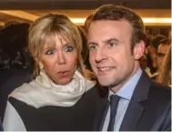  ?? CHRISTOPHE PETIT TESSON/AFP/GETTY IMAGES ?? To get ahead of stories about their relationsh­ip, Emmanuel and Brigitte Macron have been very open about their lives.