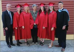  ??  ?? AMANDA JESS/THE NEWS The Pictou Academy Class of 2017 recipients of the Scammell Bursaries pose for a photo with guest speaker Jim Ryan, Helen Scammell and principal Blair MacDonald. Pictured from left to right are Ryan, Jessica Edwards, Maddi VanVeen,...