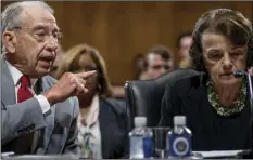  ?? PHOTO/ANDREW HARNIK ?? Senate Judiciary Committee Chairman Chuck Grassley, R-Iowa (left) accompanie­d by Sen. Dianne Feinstein, D-Calif., the ranking member (right) speaks during a Senate Judiciary Committee markup meeting on Capitol Hill, on Thursday, in Washington. AP