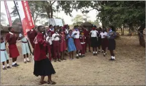  ??  ?? Mentor Teresa Kuwa and the girls enjoying themselves during a DREAMS session