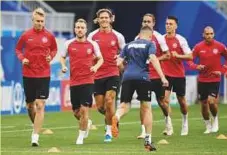  ?? AFP ?? Denmark players take a run during a training session at the Samara Arena.