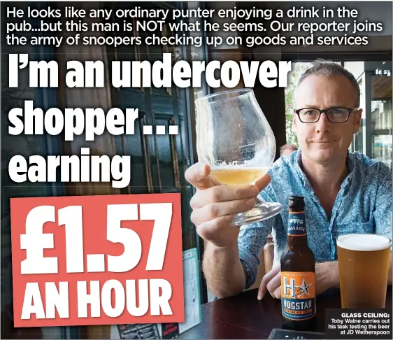  ??  ?? GLASS CEILING: Toby Walne carries out his task testing the beer at JD Wetherspoo­n