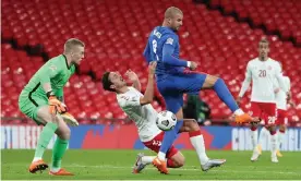  ??  ?? Jordan Pickford watches as Kyle Walker gives away a penalty against Denmark. The two players have failed to kick on since the 2018 World Cup. Photograph: Richard Pelham/ Richard Pelham NMCPool