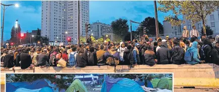  ?? Picture: AFP/GETTY ?? Migrants, above, wait to board buses after their camp, left, at Porte de la Chapelle, Paris, was ‘evacuated’ by police yesterday