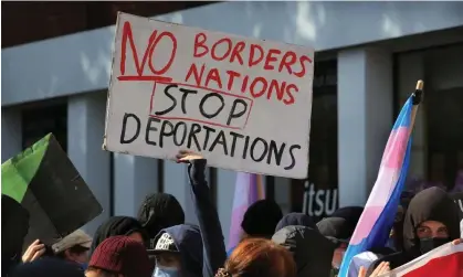  ?? Photograph: Martin Pope/Getty ?? A protester in London holds up a sign saying ‘No Borders No Nations Stop Deportatio­ns’.