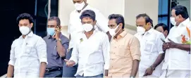  ??  ?? DMK’s youth wing secretary Udhayanidh­i Stalin along with party MLAs leaves after the oath-taking ceremony in Chennai on Tuesday
