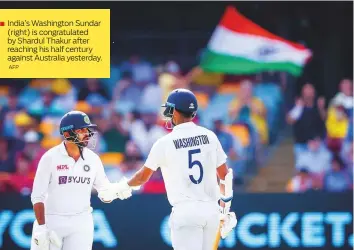  ?? AFP ?? India’s Washington Sundar (right) is congratula­ted by Shardul Thakur after reaching his half century against Australia yesterday.