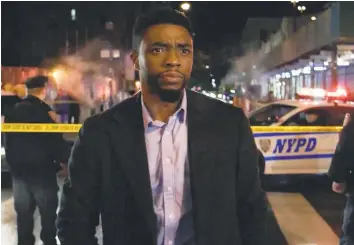  ?? Contribute­d photo ?? Chadwick Boseman stars as a “guy who kills cop killers” in “21 Bridges.”