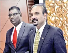  ?? — Bernama photo ?? Bukit Gelugor MP Ramkarpal Singh (right) and Jelutong MP R Sanisvara Nethaji Rayer (left) when met at Parliament lobby.