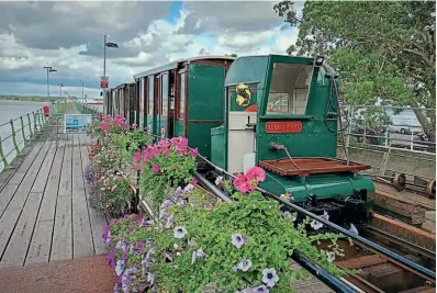  ?? ?? The Hythe Pier Railway is still very much with us today, and is all set to celebrate its centenary. The pictured original Brush locomotive is named Gerald Yorke, after the line’s original engineer. JOHN GREENWOOD